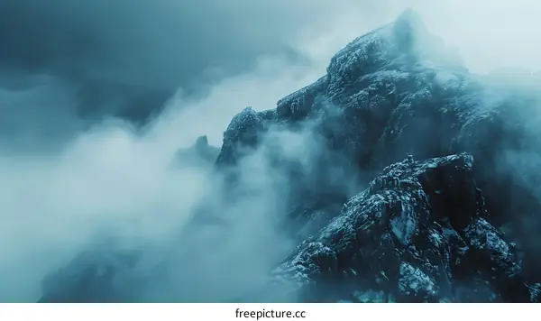 Mountain Peak Covered in Fog