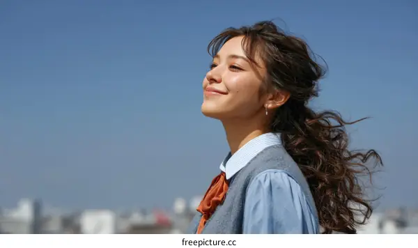 Asian Woman in Profile Outdoors