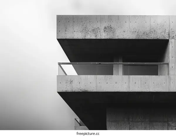 Balcony of a concrete building with a view of the sky