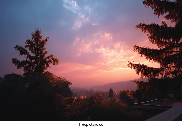 Sunset View Over City and Hills