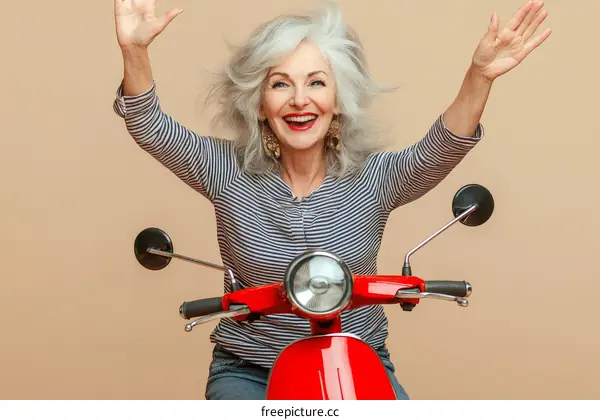 Stylish Senior Woman Riding a Scooter