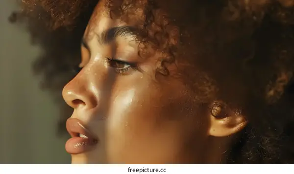 portrait of a young woman with curly hair