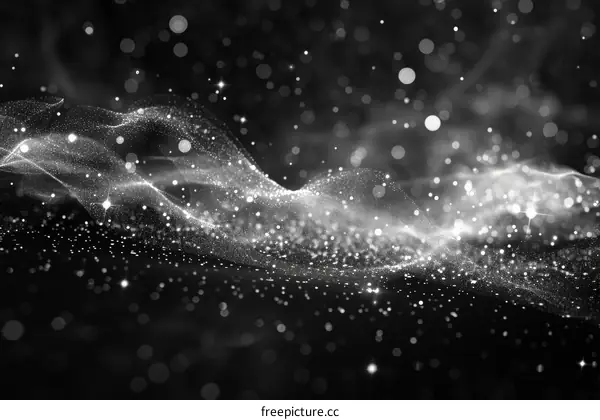 Black and white image of a flowing wave of light particles