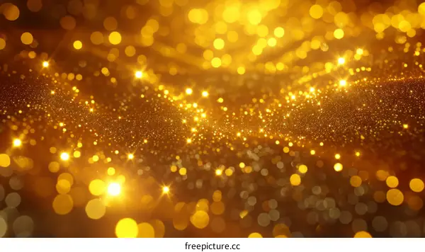 Golden glitter background with glowing stars and sparkles