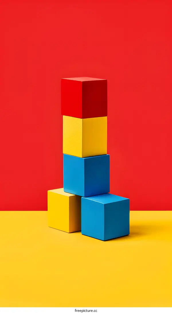 Colorful Wooden Blocks Stacked on a Yellow and Red Background