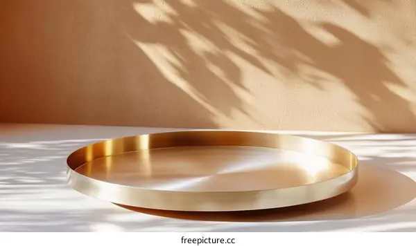 Golden Tray on Beige Background Minimalist Design