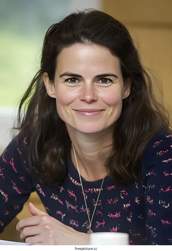 Portrait of a Woman with Brown Hair and a  Smiling Face