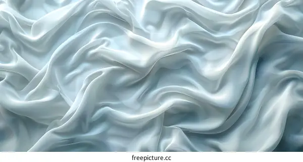 White silk fabric with soft waves flowing across the surface
