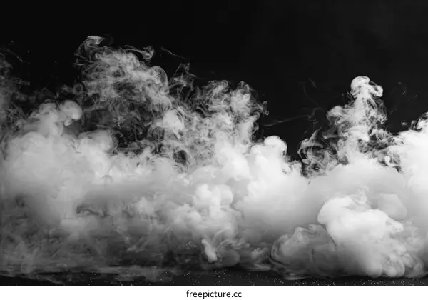 White smoke cloud on black background