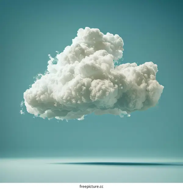 Fluffy white cloud floating in a blue sky