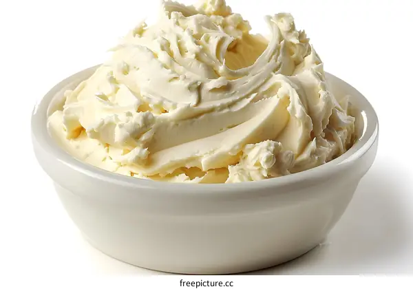 Close-up of cream cheese in white bowl