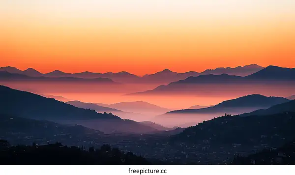 Misty Mountains at Sunrise