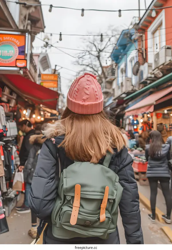 Woman Walking Through a Busy Street Market in Turkey