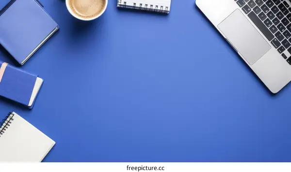 Modern Workplace Stationery and Laptop