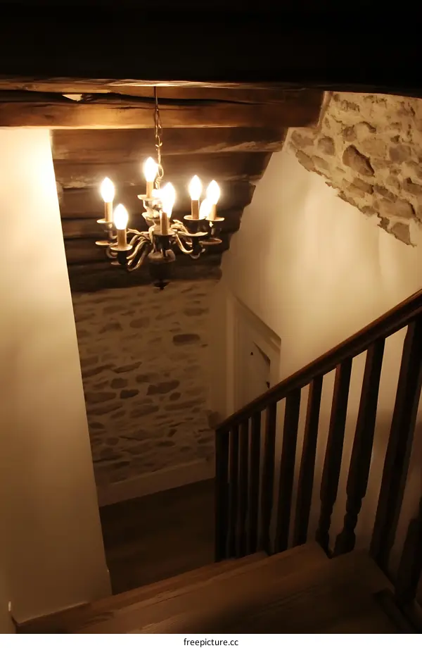 Old Stone Wall Staircase with Chandelier