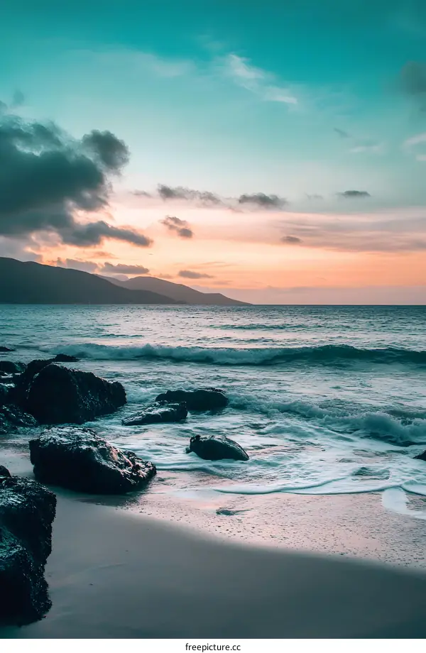 Seascape with Mountains and Clouds at Sunset