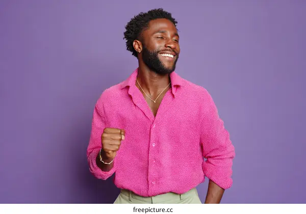 Smiling Black Man in a Vibrant Pink Shirt