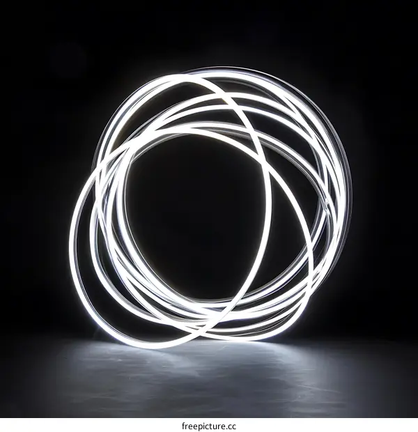 Abstract White Light Circles in Dark Background