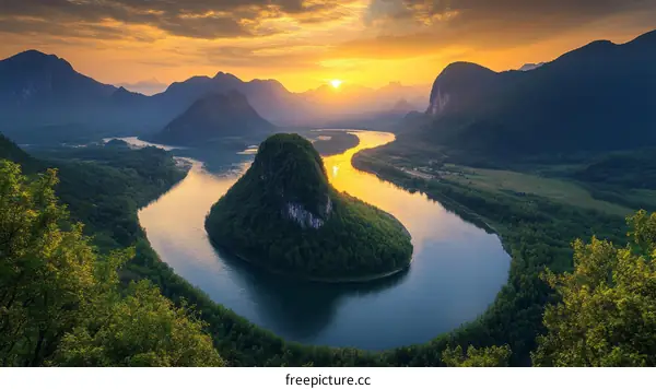 Majestic River Meandering Through Mountains at Sunrise