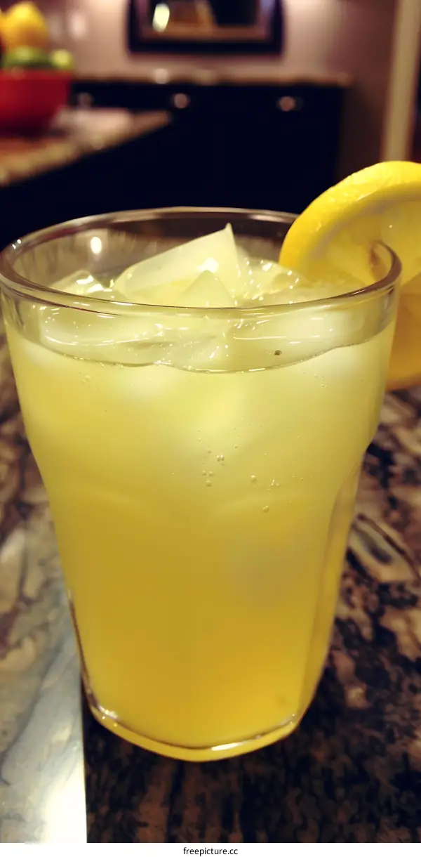 Glass of Lemonade with Ice and Lemon Slice