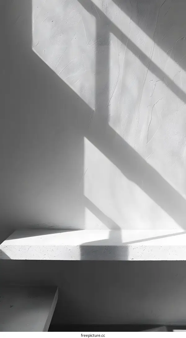 Minimalist White Wall with Shelf and Window Light