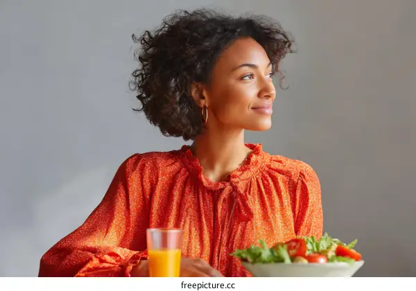 Woman enjoying a healthy salad lunch