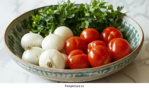 Onions, tomatoes and parsley in a bowl