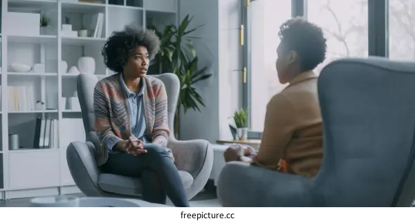 A woman talking to a therapist about her problems