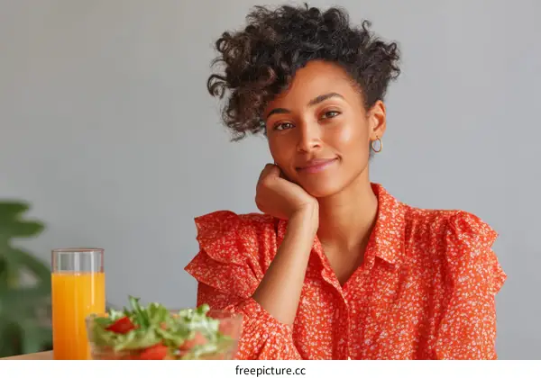 Portrait of a Woman in an Orange Blouse