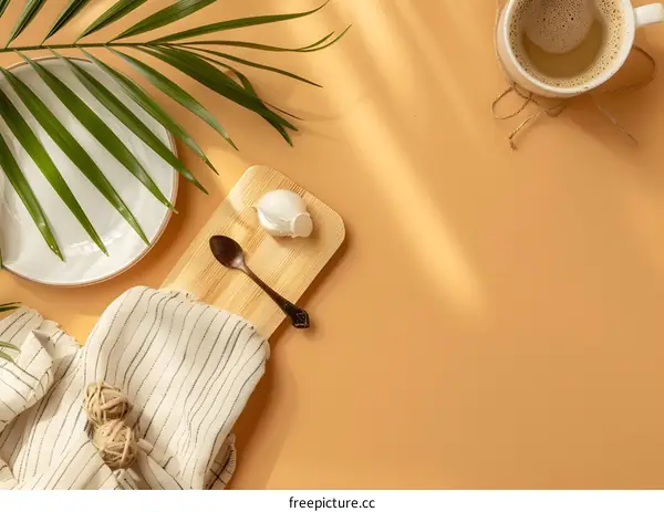 Minimalist Flat Lay with Palm Leaves, Wooden Cutting Board, Spoon and Garlic