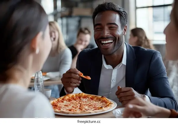 Group enjoying pizza in a restaurant