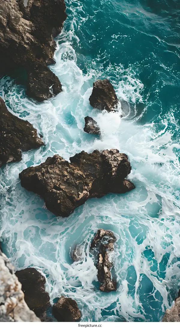 Ocean Waves Crashing on Rocks from Above