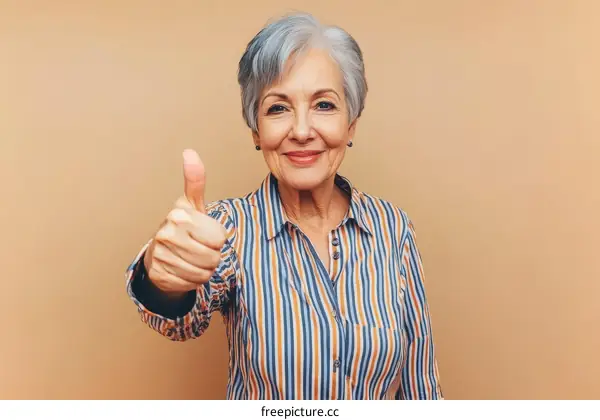 Senior Woman Giving a Thumbs Up Portrait