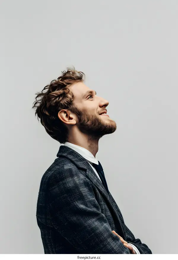 Portrait of a happy young man looking away