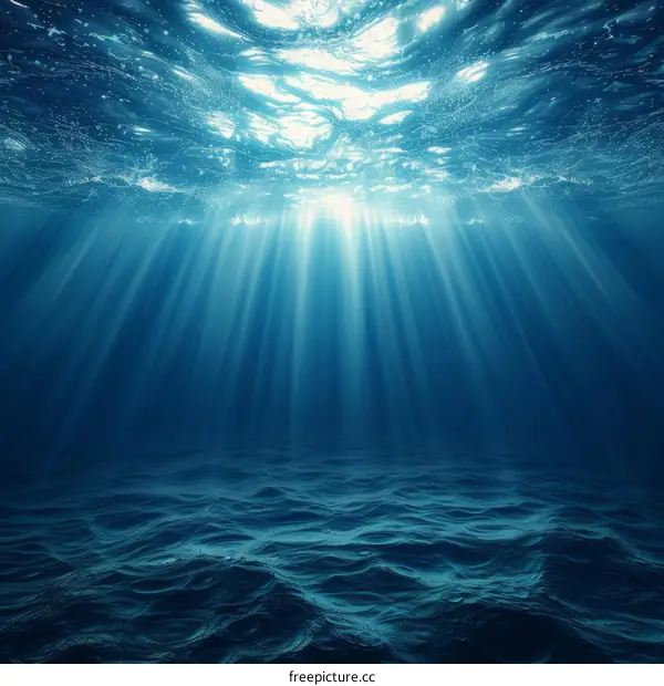 Underwater Ocean Scene with Sunlight Rays Shining Through the Water Surface