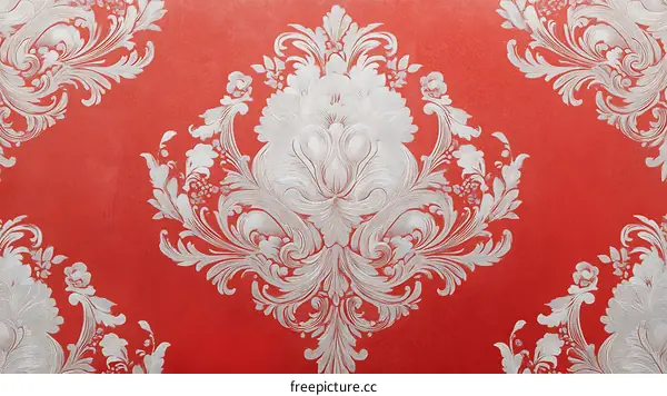 Red Wallpaper with Intricate Silver Damask Pattern