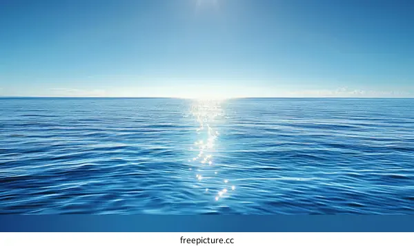 Blue ocean with sun reflecting off the surface
