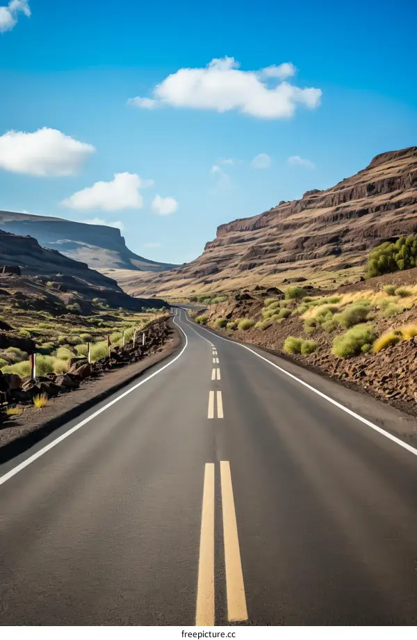 Long and winding road through canyon