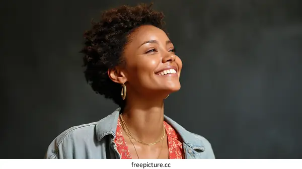 Joyful Woman Portrait Against Dark Background