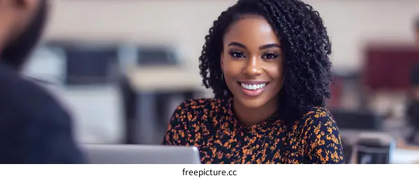 Smiling Businesswoman Working in Modern Office