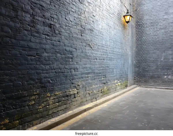 Dark Brick Alleyway with Vintage Lantern