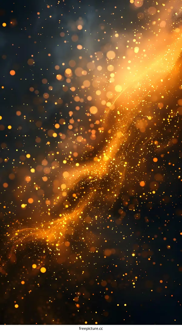 Golden glitter particles flowing on dark background