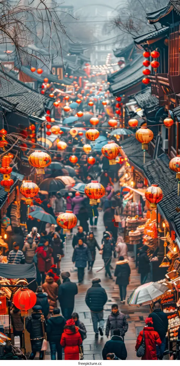 Crowded street with red lanterns during Chinese New Year