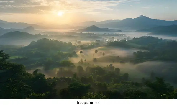 Beautiful sunrise over the misty valley