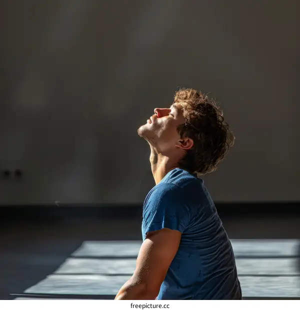 Young male dancer enjoying the sunlight