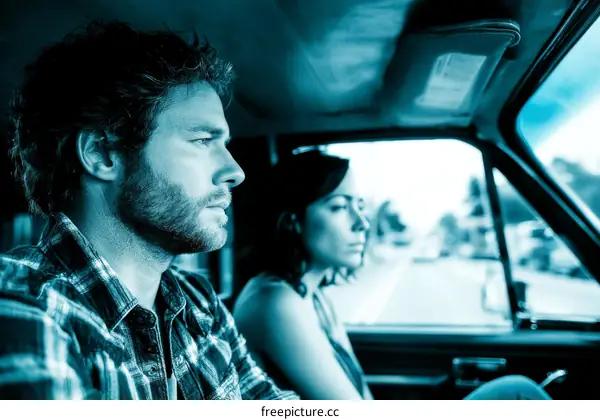 Two People in a Vintage Car