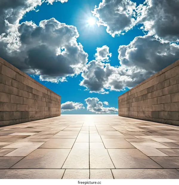 Stone Pathway Leading to the Sky with Clouds and Sun