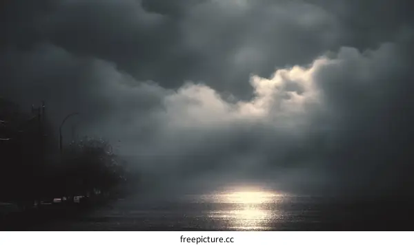 Misty Morning Sunrise Over the Water