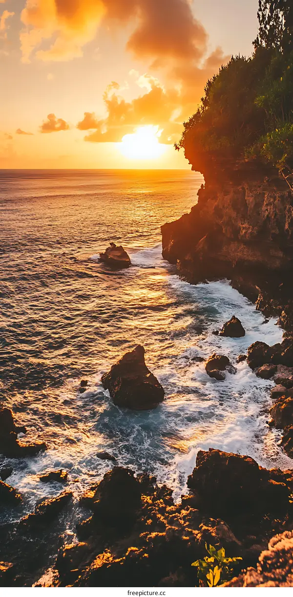 Golden Sunset Over Rocky Coastline