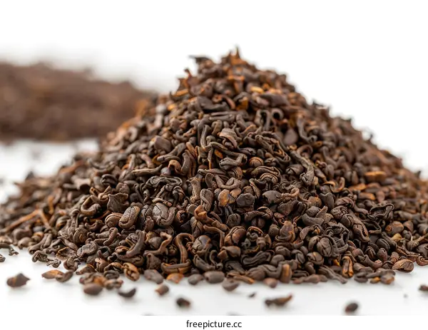 Loose Black Tea Leaves on White Background